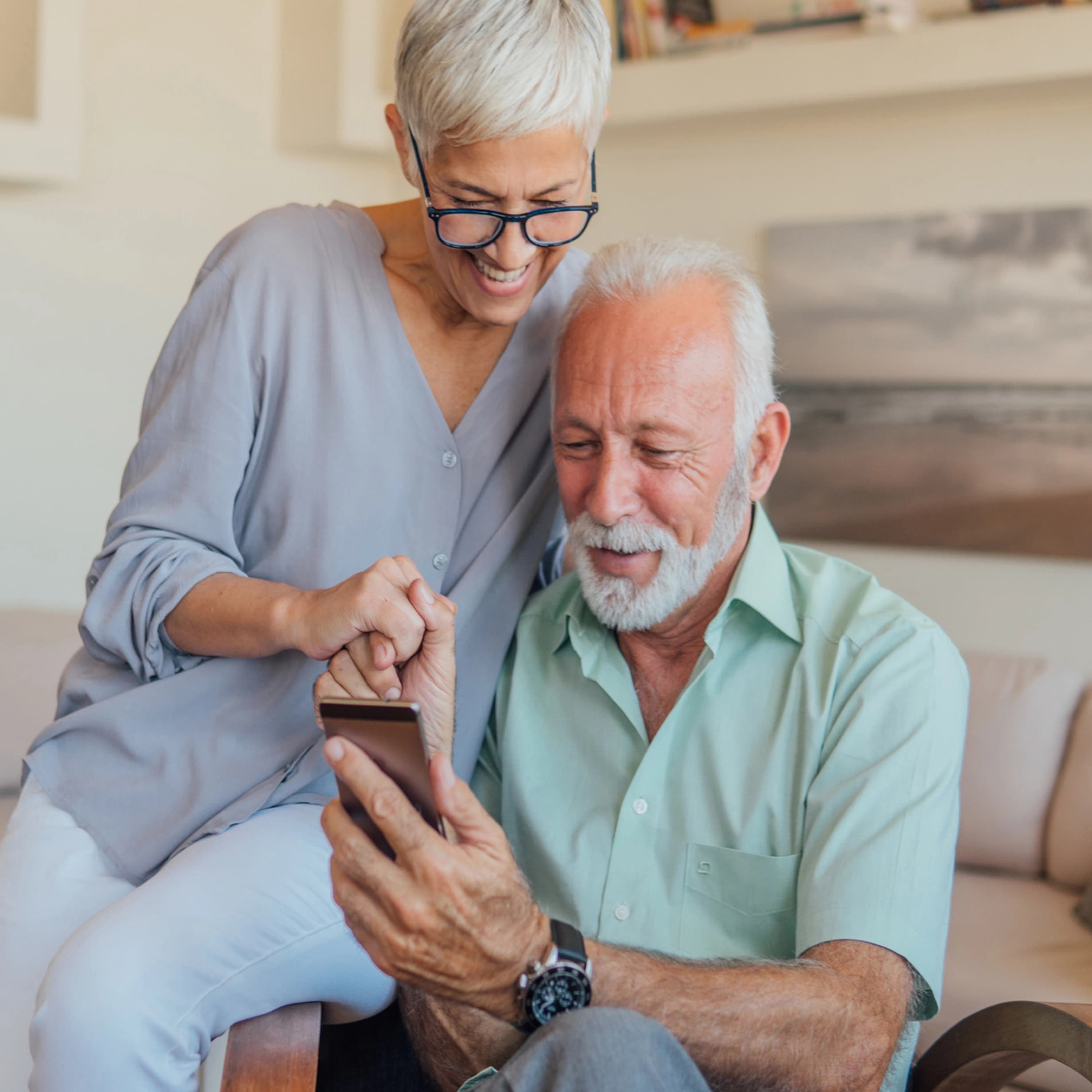 Couple using mobile phone